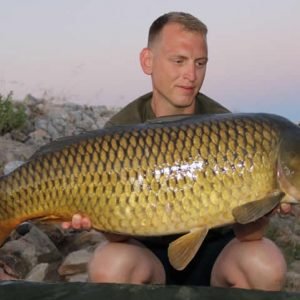 Man holding mirror carp