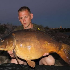 Man holding big carp